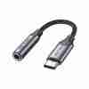 Vention BGMHA USB-C to 3.5 mm adapter cable showing gray aluminum alloy housing Close-up of gold-plated USB-C connector and 3.5 mm jack on the Vention adapter Vention DAC adapter plugged into a Pixel smartphone with earphones attached Side profile of the slim 0.1 m Vention audio adapter against a white background Vention audio adapter alongside a pair of 3.5 mm headphones and USB-C laptop port Cable shot highlighting the braided PVC jacket and aluminum housing of the adapter
