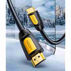 UGREEN 15m HDMI cable coiled with gold-plated connectors visible Close-up of gold-plated HDMI male connectors on UGREEN HD101 cable UGREEN HDMI cable connecting gaming console to a 4K TV UGREEN HDMI cable used in a conference room projection setup UGREEN HD101 15m cable with yellow-black design on white background HDMI cable plugged into a projector and media player in a home theater setup