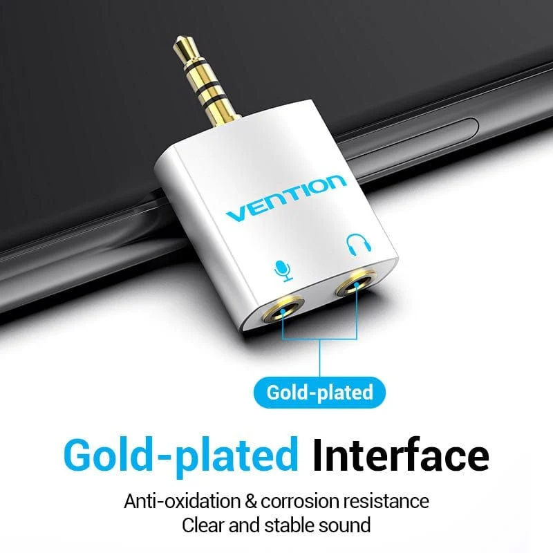 Vention 3.5mm male to dual female audio splitter close-up view" "Vention VEN-BDAW0 headphone adapter connected to a smartphone" "Dual headphone jack splitter by Vention on a white background" "Compact 3.5mm audio splitter for shared headphone use" "Vention audio converter for mobile, laptop, and tablet use" "Black 4-pole 3.5mm splitter with durable ABS build"