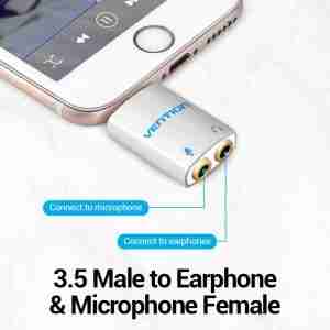 Vention 3.5mm male to dual female audio splitter close-up view" "Vention VEN-BDAW0 headphone adapter connected to a smartphone" "Dual headphone jack splitter by Vention on a white background" "Compact 3.5mm audio splitter for shared headphone use" "Vention audio converter for mobile, laptop, and tablet use" "Black 4-pole 3.5mm splitter with durable ABS build"