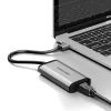 Vention CKBHB docking station showing three USB 3.0 ports and RJ45 Ethernet port on a desk Side view of the aluminum alloy unibody housing with LED activity indicators lit Close-up of the RJ45 Gigabit Ethernet port on the Vention USB hub Vention docking station plugged into a MacBook Air port with network cable attached Top-down shot highlighting the three SuperSpeed USB 3.0 ports on the CKBHB dock Vention CKBHB hub next to a Surface Pro and Chromebook, demonstrating cross-device compatibility