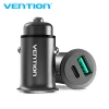 Vention VEN-QC67-UK-B gray car charger with two USB-A ports inserted into a vehicle socket Close-up of the charger’s aluminum-alloy body and gold-plated USB connector Side view showing the compact mini-style design and PVC jacket cable Detail of USB-A port labels “5V⎓5A / 9V⎓3A / 12V⎓2.5A” on the charger body Vention car charger plugged into a car dashboard charging a smartphone via USB-C Top-down shot of the dual-port charger removed from the socket, highlighting its slim profile