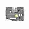 Compatible Brother TZ2-141 18mm black on clear label roll Black on clear label applied to glass surface Brother P-Touch printer with TZ2-141 tape installed Close-up of transparent label with black text TZ2-141 compatible tape used on office folders Packaging of 18mm clear laminated label tape
