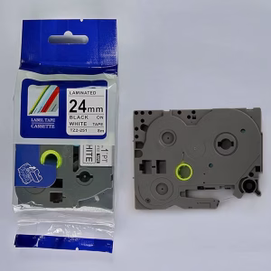 Compatible Brother TZ2-251 24mm black on white tape cartridge Laminated black on white label printed with TZ2-251 tape Brother P-Touch label maker with TZ2-251 tape installed Sample 24mm wide label applied to equipment or folder TZ2-251 label tape roll in packaging Durable Brother-compatible label on outdoor metal surface