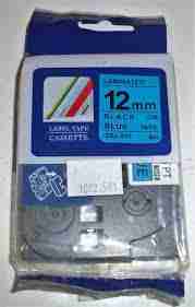 Compatible Brother TZ2-531 black on blue 12mm label tape roll Brother P-touch printer with TZ2-531 label installed Sample label with black text on blue background Laminated label applied to storage bin or cable Close-up of TZ2-531 tape cartridge and backing Durable blue label used in an industrial setting Let me know if you'd like this bundled with matching accessories (e.g., other 12mm