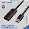 Vention CBMBJ 5M USB 3.0 active extension cable front view USB Type-A male to female cable black color 5 meters Signal boosting chipset close-up on Vention CBMBJ cable Vention USB 3.0 extension plugged into laptop and external device Coiled view of 5-meter Vention USB cable with reinforced ends Vention CBMBJ cable packaging with cable layout shown