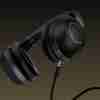 Vention SoundMate NBBB0 wireless headphones front view Side angle of Vention on-ear Bluetooth headphones Vention SoundMate NBBB0 with soft ear cushions Built-in control buttons on Vention wireless headphones Vention headphones charging via USB cable Lifestyle image of Vention headphones in use with mobile device