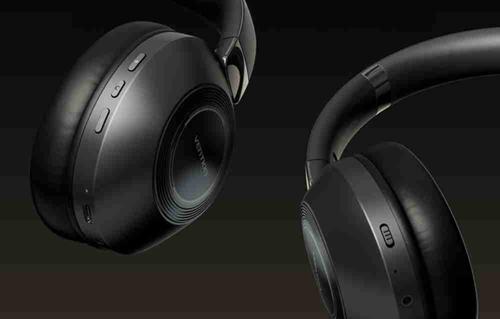 Vention SoundMate NBBB0 wireless headphones front view Side angle of Vention on-ear Bluetooth headphones Vention SoundMate NBBB0 with soft ear cushions Built-in control buttons on Vention wireless headphones Vention headphones charging via USB cable Lifestyle image of Vention headphones in use with mobile device