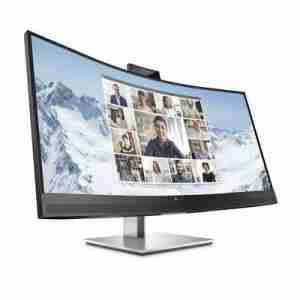 HP E34m G4 front view showcasing the curved WQHD display Pop-up 5MP webcam with dual microphones on HP conferencing monitor Rear view showing USB-C, USB-A, HDMI, DisplayPort, and Ethernet ports Side profile displaying height and tilt adjustment Monitor setup with USB-C laptop connection for power and video HP E34m G4 used in a professional video call environment
