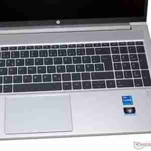 HP ProBook 450 G10 front view with display on Side profile showing ports and slim design Backlit keyboard close-up Top view highlighting the touchpad and keyboard layout Pike Silver finish showcasing the laptop's sleek design HP ProBook 450 G10 open at a 90-degree angle