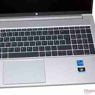 HP ProBook 450 G10 front view with display on Side profile showing ports and slim design Backlit keyboard close-up Top view highlighting the touchpad and keyboard layout Pike Silver finish showcasing the laptop's sleek design HP ProBook 450 G10 open at a 90-degree angle
