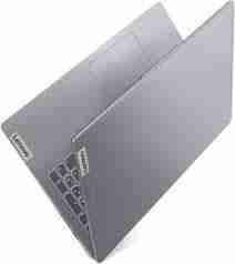 Front view of Lenovo IdeaPad Slim 3 15IRH8 in Arctic Grey. Side profile showcasing the slim design of the Lenovo IdeaPad Slim 3 15IRH8. Top-down view highlighting the keyboard and touchpad of the Lenovo IdeaPad Slim 3 15IRH8. Rear view displaying the hinge and branding of the Lenovo IdeaPad Slim 3 15IRH8. Close-up of the 15.6" FHD display on the Lenovo IdeaPad Slim 3 15IRH8. Lenovo IdeaPad Slim 3 15IRH8 connected to peripherals via USB and HDMI ports.