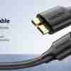 UGREEN USB 3.0 to Micro USB 3.0 Cable full length USB-A 3.0 connector close-up Micro USB 3.0 Male (Micro-B) tip close-up Cable connected to external hard drive UGREEN US130 retail packaging Black 1-meter UGREEN data cable coiled