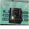 Front-facing Lightwave LW 2000VA UPS with LED panel Side-angle view showing air vents and design Rear view with 3‑pin socket output UPS powering a PC, monitor, and router setup LED indicators lit during battery operation Close-up of audible alarm speaker and status LEDs