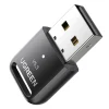 UGREEN AX300 USB WiFi Adapter front view AX300 Wi-Fi 6 dongle inserted in a laptop USB port Compact design of UGREEN CM760 35262 WiFi dongle Dual-band USB WiFi adapter side profile UGREEN USB-A wireless dongle close-up AX300 adapter shown next to a laptop and router