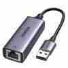 UGREEN CM209 USB 3.0 to RJ45 Ethernet adapter angled view USB-A male connector on UGREEN Gigabit adapter UGREEN CM209 plugged into laptop for wired network access UGREEN 50922 Ethernet adapter with LED indicators Close-up of RJ45 Ethernet port on UGREEN USB adapter Packaging of UGREEN USB to Gigabit Ethernet Adapter CM209