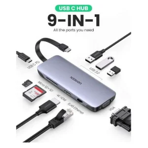 UGREEN CM498 9-in-1 Docking Station with multiple USB 3.0 and HDMI ports HDMI and VGA output ports on UGREEN CM498 docking station 100W PD charging port for laptops and tablets on UGREEN CM498 SD/TF card readers on UGREEN CM498 Docking Station Compact and portable UGREEN CM498 9-in-1 Docking Station UGREEN CM498 connected to a laptop with peripherals attached