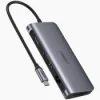 UGREEN CM512 6-in-1 Docking Station with multiple USB 3.0 and HDMI ports HDMI output and Gigabit Ethernet on UGREEN docking station 100W PD charging port for laptops and tablets on UGREEN CM512 Compact and portable UGREEN CM512 Docking Station in use Close-up of UGREEN docking station showing USB, HDMI, and Ethernet ports UGREEN CM512 connected to a laptop, providing 4K output and high-speed internet