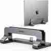 UGREEN LP258 Vertical Laptop Stand side view Adjustable aluminum laptop holder with silicone pads UGREEN 25706 stand holding a closed MacBook Vertical laptop stand on minimalist desk setup Close-up of adjustment knob on UGREEN LP258 Packaging of UGREEN LP258 aluminum vertical stand