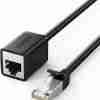 UGREEN NW112 Cat6 male-to-female extension cable 3 m coiled Close-up of RJ45 male and female connectors on NW112 cable Ethernet extension cable plugged into router port Foil-shielded Cat6 cable texture visible on UGREEN NW112 Back-of-desk setup using 3 m extension for a PC Retail packaging of UGREEN NW112 Ethernet extension cable