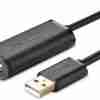 UGREEN US121 15M USB extension cable rolled with visible connectors Close-up of UGREEN 10323 chipset-enhanced USB 2.0 extension cable USB-A female port of UGREEN active extension connected to webcam USB-A male connector from UGREEN 15M cable inserted into desktop PC Retail packaging of UGREEN US121 USB 2.0 Active Extension Cable Extended office setup using UGREEN 15M USB cable for long-range printer