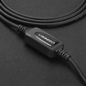 UGREEN US122 USB 2.0 A to B 15M cable coiled neatly Close-up of USB-A male and USB-B male connectors UGREEN 10362 cable connected to a printer from a distant PC UGREEN 15-meter active USB printer cable packaging USB 2.0 active extension cable for printers by UGREEN Office setup using UGREEN US122 15M USB printer cable