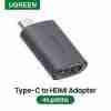 UGREEN USB-C to HDMI Adapter 70450 side angle Close-up of USB-C male and HDMI female ends Adapter connecting MacBook to 4K display UGREEN 70450 used in an office presentation setup Slim and portable USB-C to HDMI 60Hz converter Product packaging of UGREEN 4K USB-C to HDMI adapter