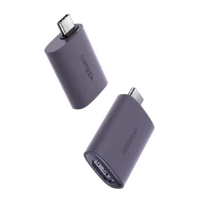 UGREEN USB-C to HDMI Adapter 70450 side angle Close-up of USB-C male and HDMI female ends Adapter connecting MacBook to 4K display UGREEN 70450 used in an office presentation setup Slim and portable USB-C to HDMI 60Hz converter Product packaging of UGREEN 4K USB-C to HDMI adapter