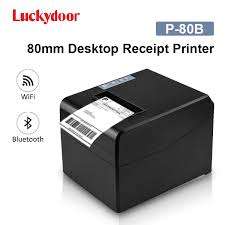 Syble P80-B desktop receipt printer front view Syble P80-B receipt printer with paper roll inserted Side view of Syble P80-B printer on counter Receipt being printed from Syble P80-B Back panel ports of Syble P80-B printer Compact Syble P80-B thermal printer next to POS terminal