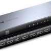 Vention 1x8 HDMI splitter black aluminum 4K HDMI splitter with 8 outputs HDMI splitter ports front view Multi display HDMI distribution device Aluminum HDMI splitter Vention AKQBO HDMI splitter setup with multiple screens