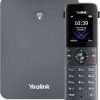 Yealink W73P DECT cordless phone system Yealink W73P handset and base station setup W73P office wireless VoIP phone Yealink DECT phone with color display W73P business communication system Yealink cordless IP phone on desk