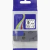 Brother TZC-S121 9mm black on clear label cartridge Compatible laminated label tape for Brother printers Clear label tape with black print 9mm labeling tape cartridge close-up Label tape installed in printer Durable laminated label for office use
