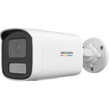 Hikvision ColorVu bullet camera with strobe alarm Long-range Hikvision outdoor security camera installed Red and blue strobe light security camera at night Smart Hybrid Light camera illumination example Hikvision 4MP bullet camera side profile Outdoor CCTV camera monitoring large compound